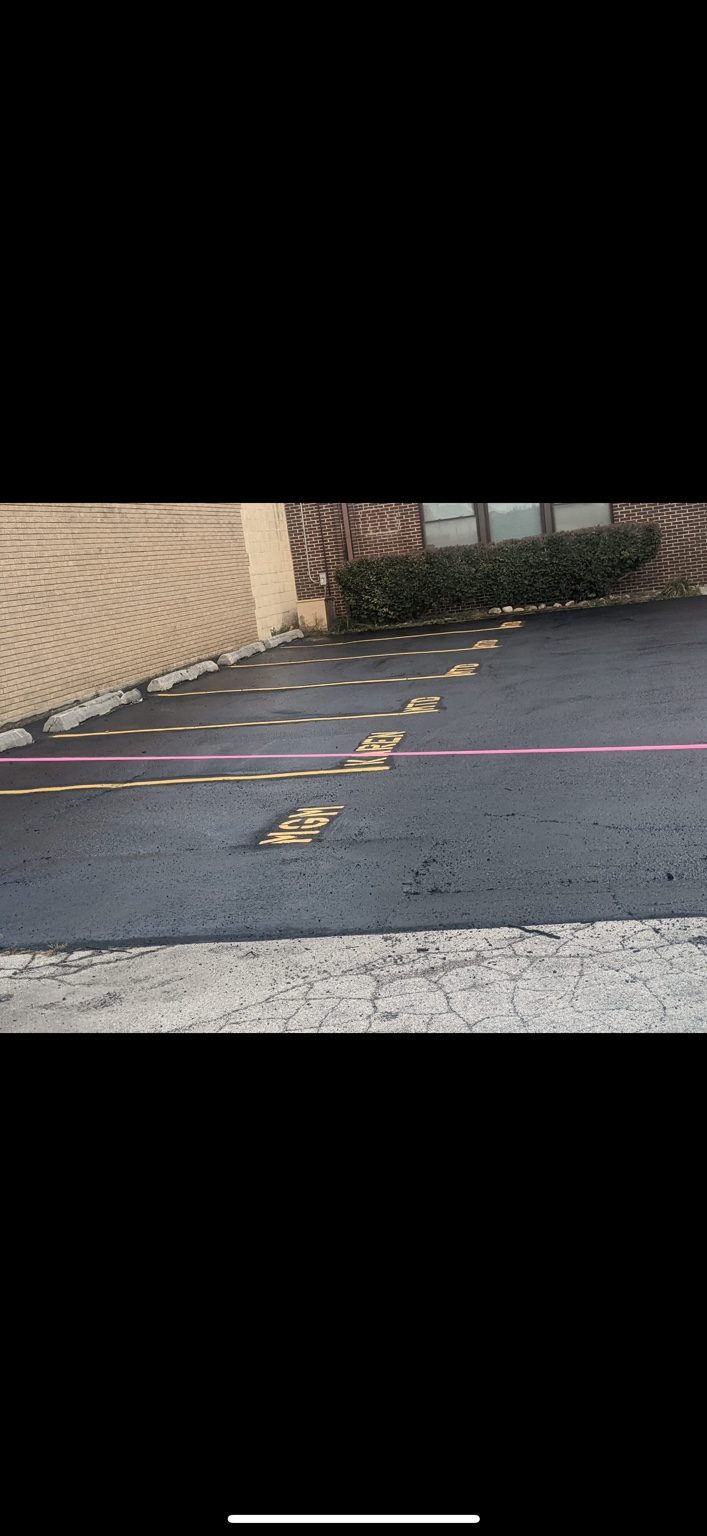 Residential driveway sealcoating