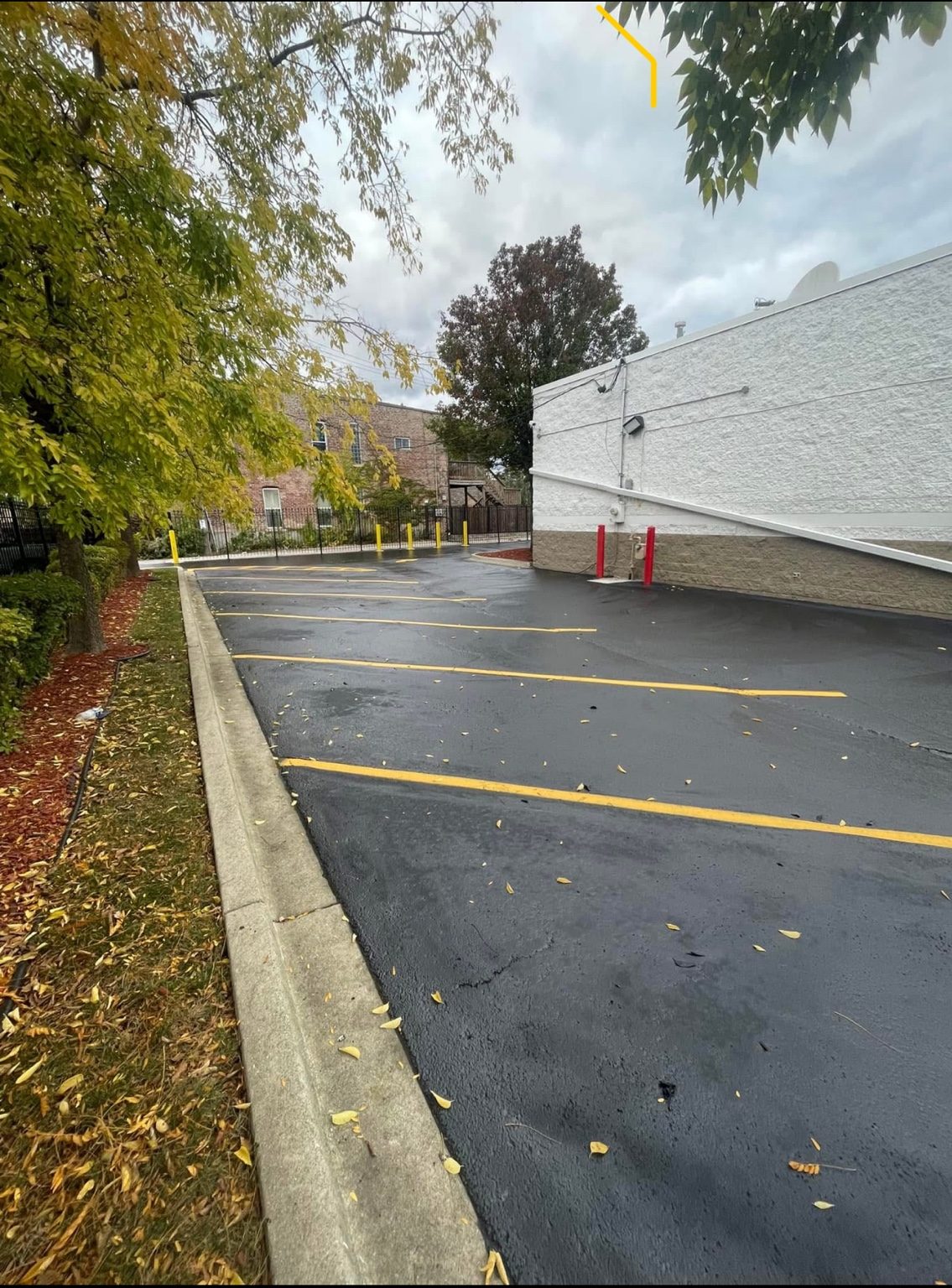 Residential driveway sealcoating